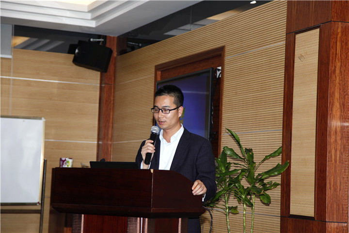 01.图为国际部胡化忠主任做工作执行报告